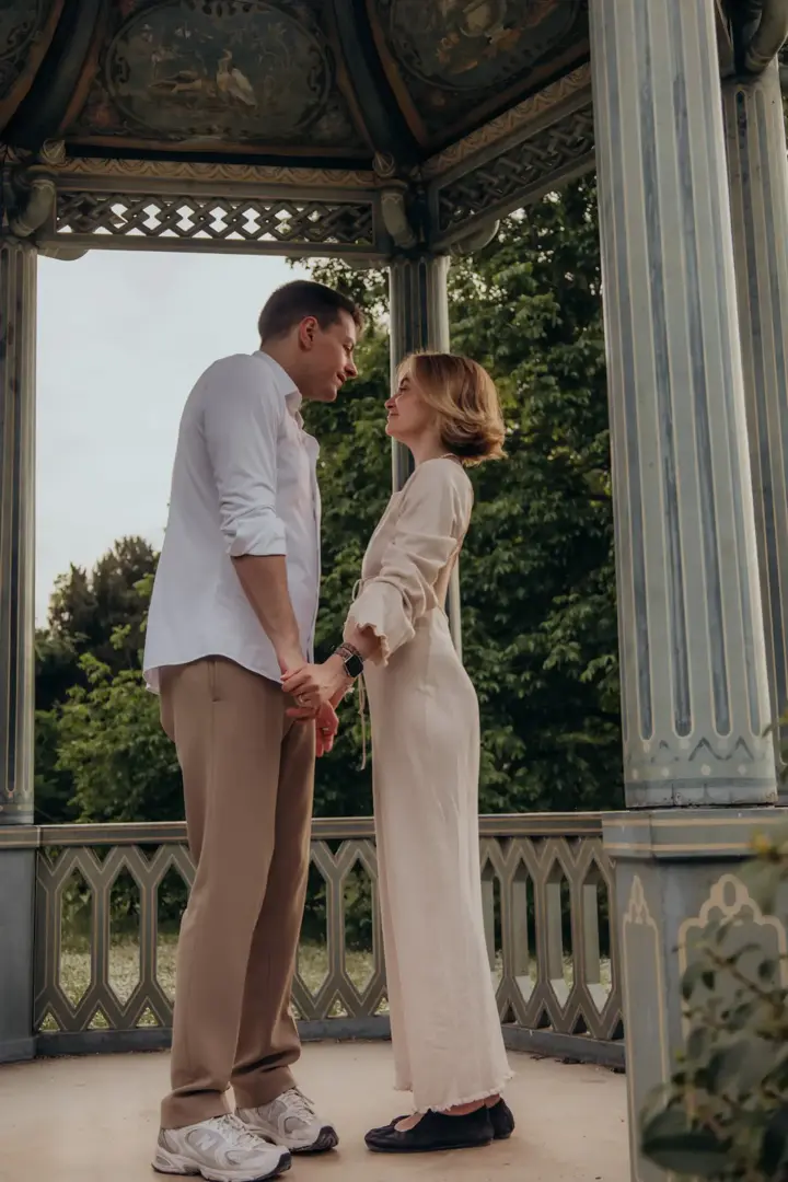 Couple holding hands gazebo garden romantic Paris